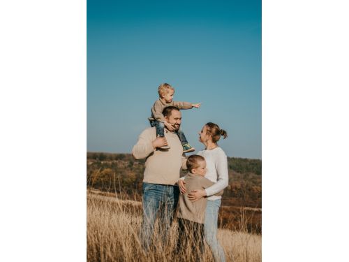 younger couple with two kids